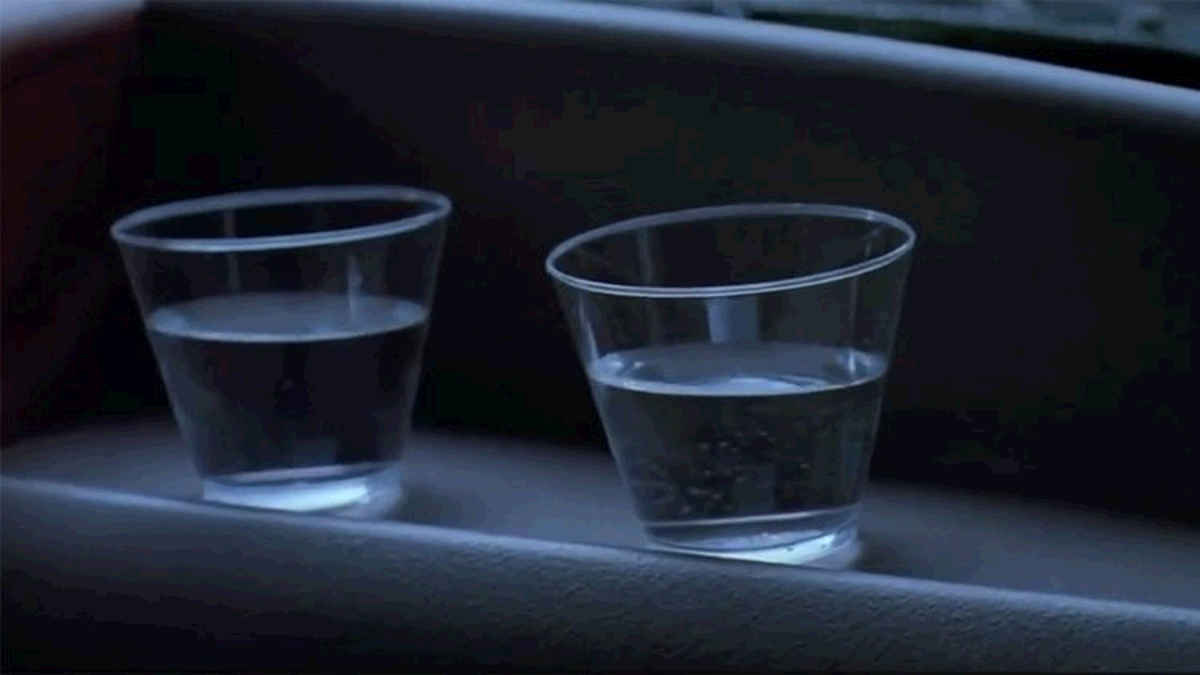 The famous scene of two water cups from Jurassic Park (1993)