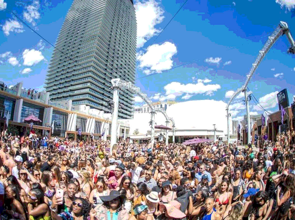 Enthusiastic clubbers enjoy the Marquee dayclub on a nice day