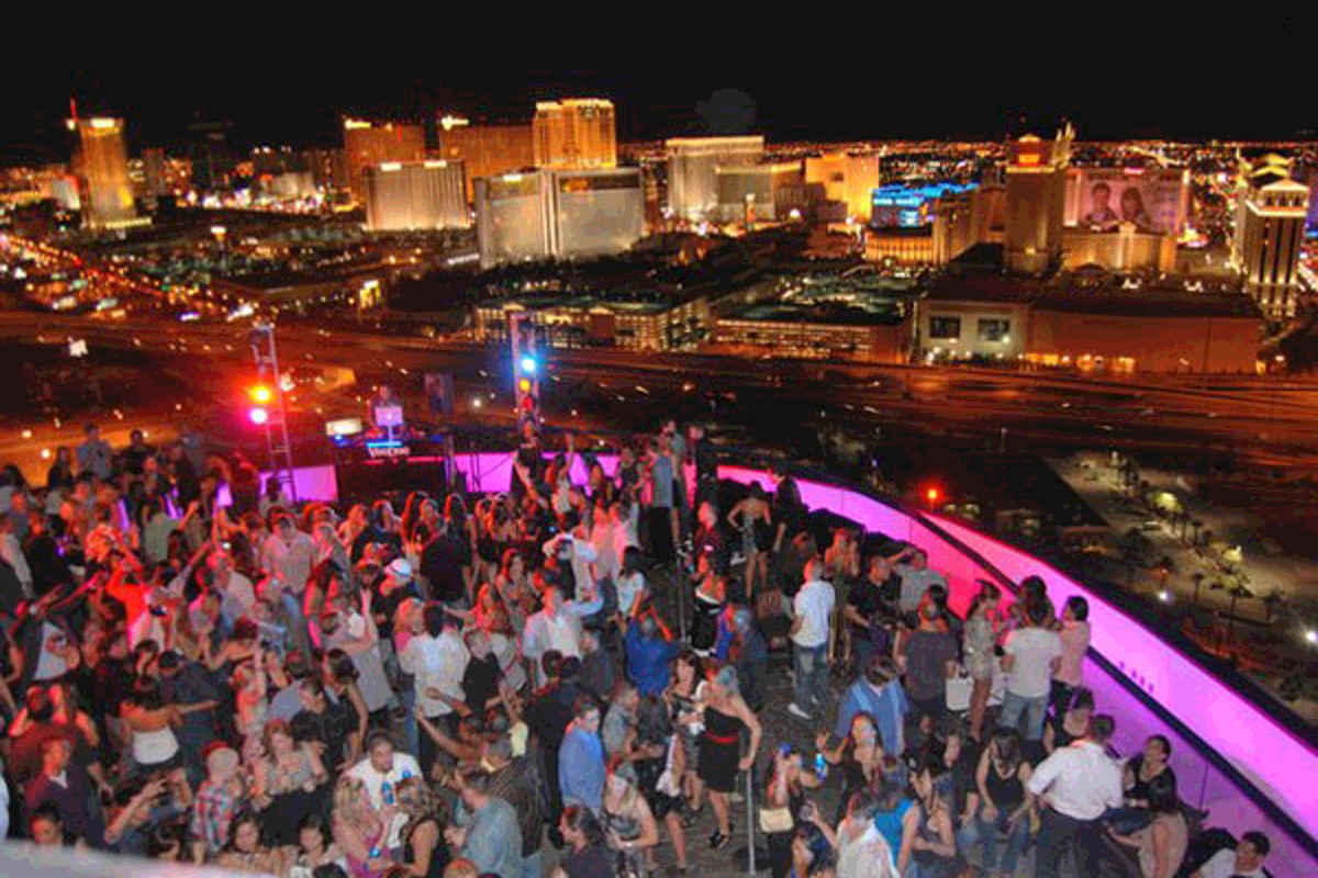 Clubbers enjoy the VooDoo rooftop nightclub